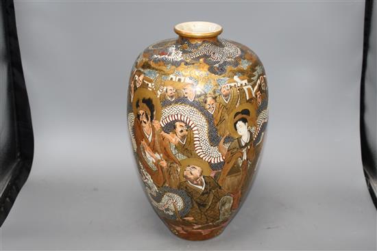 A Japanese Satsuma vase, decorated with a dragon and immortals, signed to the base, height 36cm